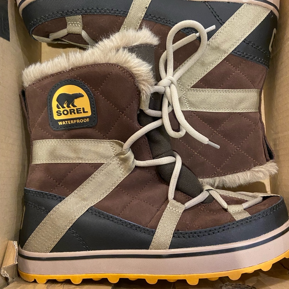 Sorel Glacy Explorer Shortie Waterproof Boots. The color listed is Tobacco.